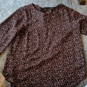 Black blouse with zipper down the back